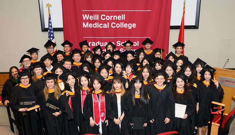 Students pose at the PHS Grad School Convocation