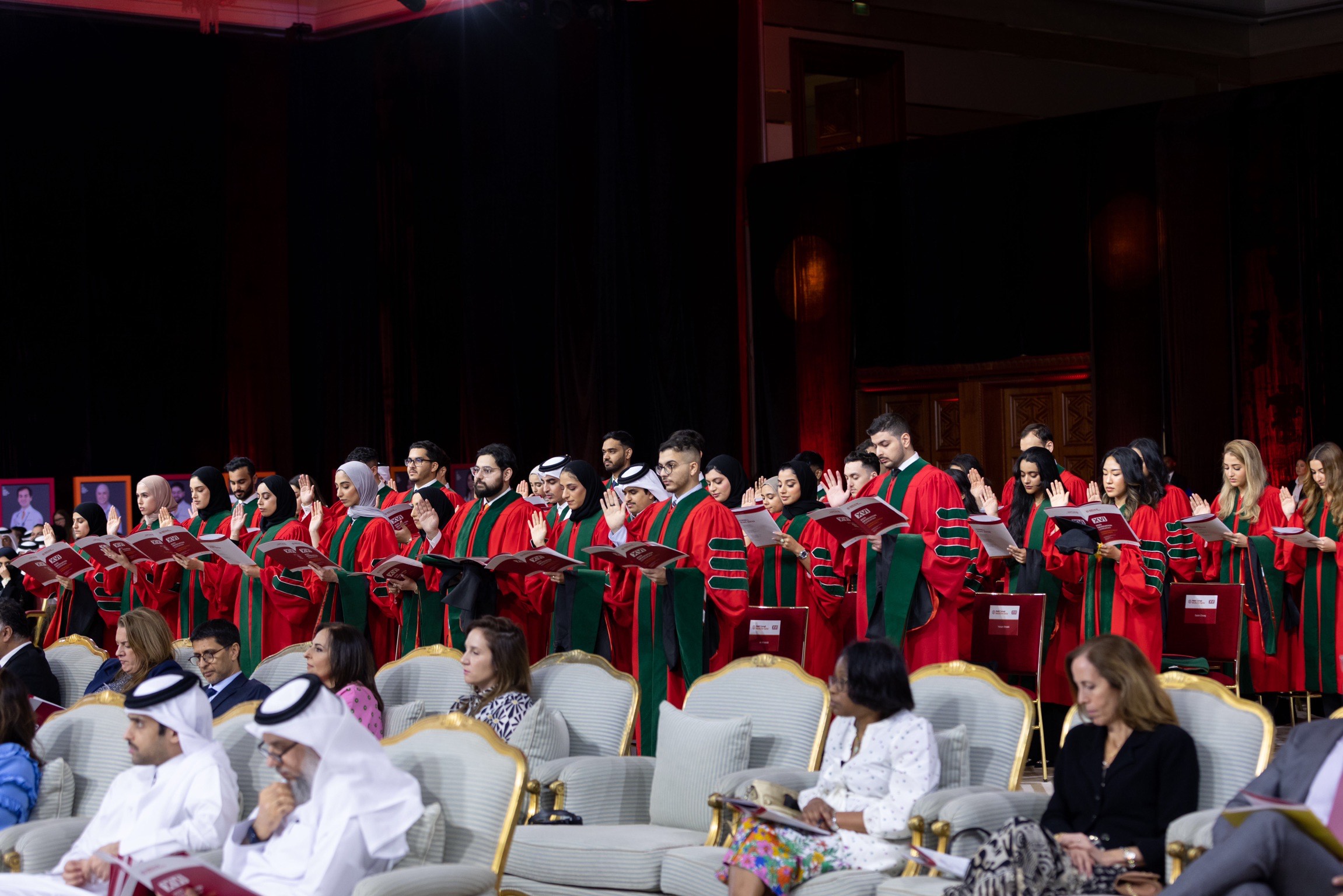 Students in Weill Cornell Medicine-Qatar's Class of 2023 recite the Hippocratic Oath during commencement.