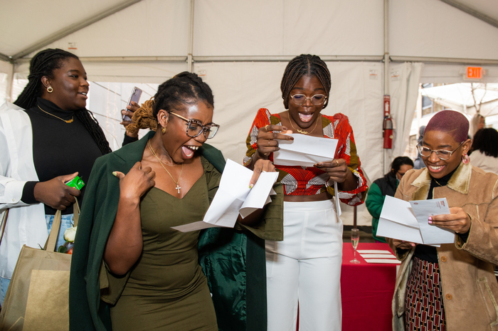 Weill Cornell Medicine student Chimsom Orakwue (second from left) celebrates her residency match with classmates Ganiat Alakiu (center) and Jayleecia Smith (right) on March 17 during national Match Day.